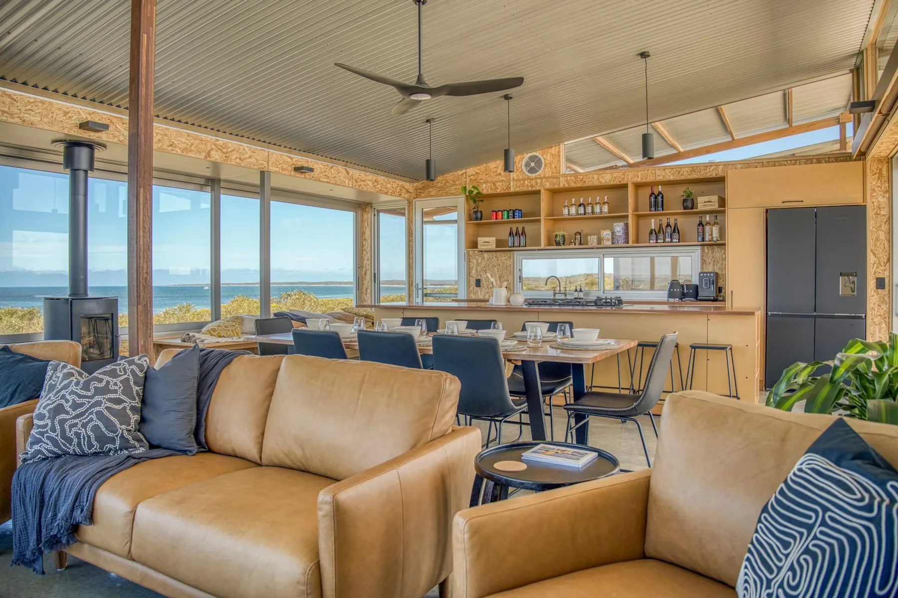 The living and dining pavilion open to the ocean