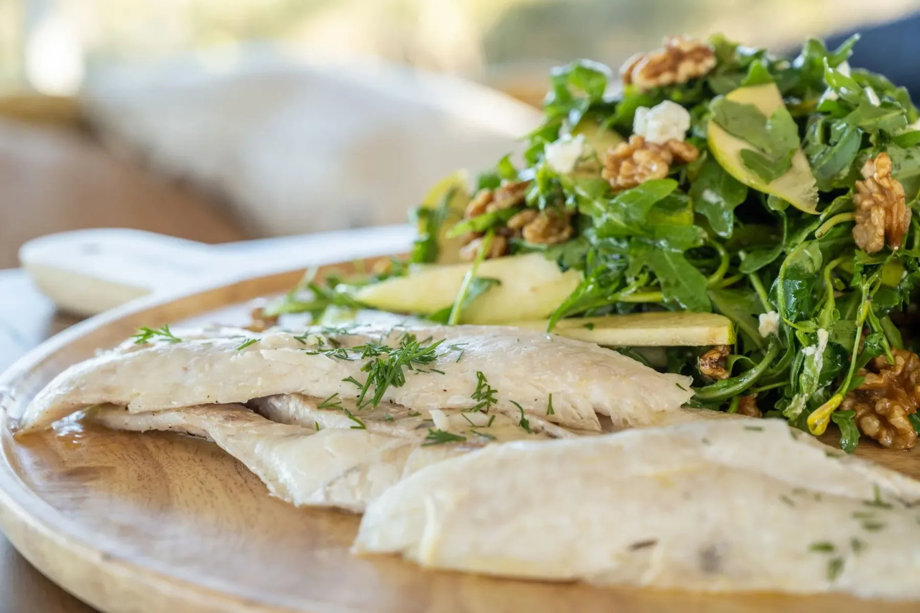 Fresh flathead fillets with pear, rocket and walnut salad